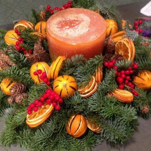 Luxury Christmas scented candle arrangement orange multi wick available to order from Kensington flowers London